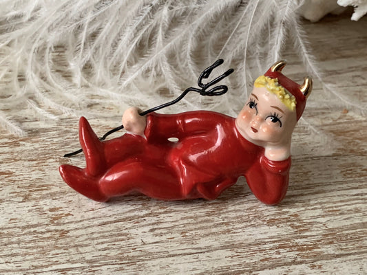Vintage mini lounging devil pixie figurine