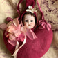 Antique doll head pincushion