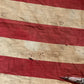 Vintage tattered old 48 star USA flag