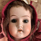 Antique doll head pincushion