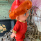 Vintage Holiday Fair devil baby doll