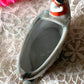 Vintage miniature bathing beauty in boat