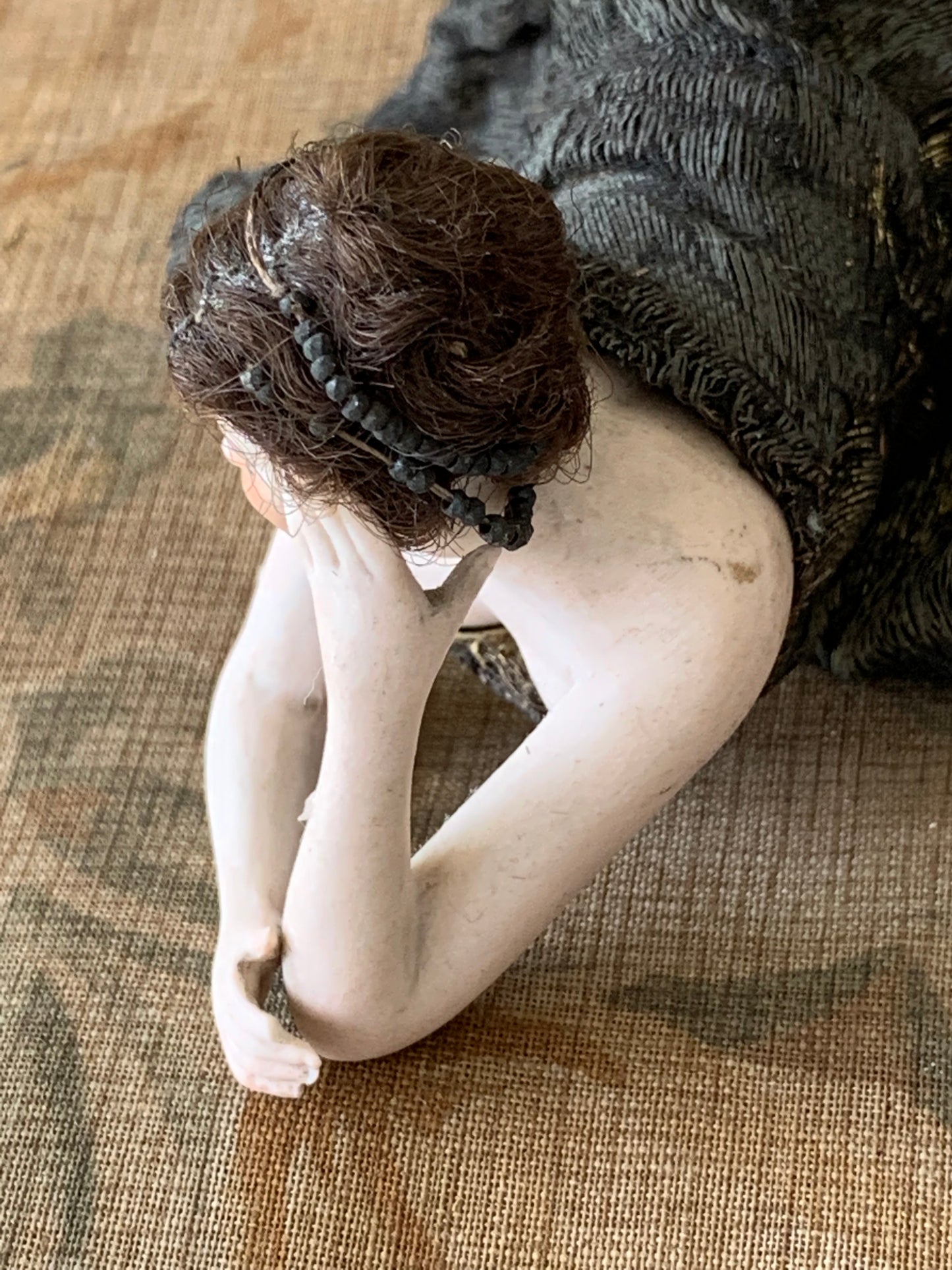 Antique miniature bathing beauty figurine