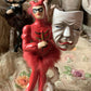 Vintage devil ballerina boy with mask