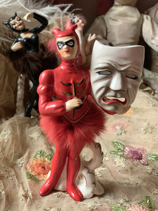 Vintage devil ballerina boy with mask