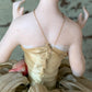 Antique porcelain masked girl figurine