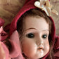 Antique doll head pincushion