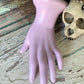 Vintage lavender painted ceramic hand figurine ring holder