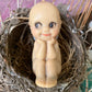 Vintage mini Rose Oneill rubber squeak toy kewpie