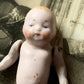 Vintage mini German jointed baby doll