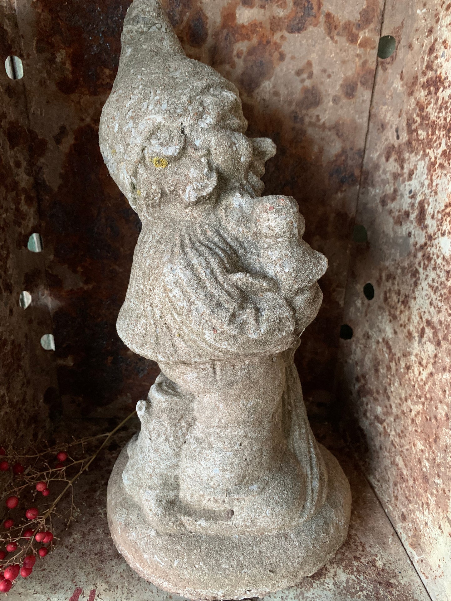 Vintage concrete garden gnome statue