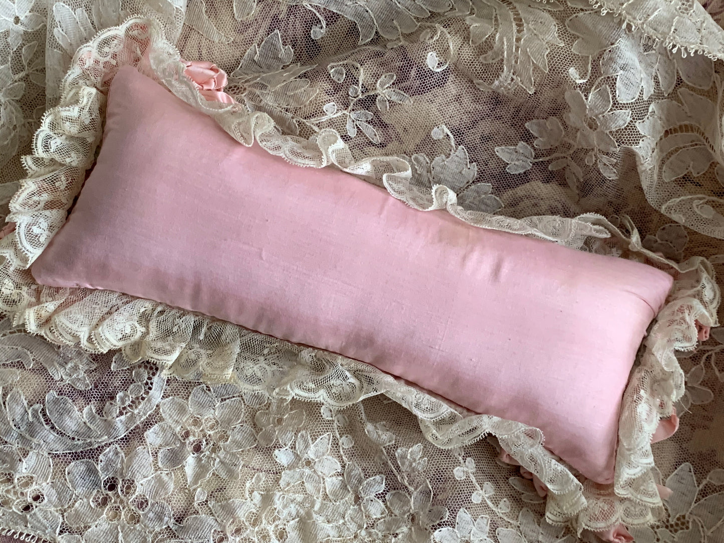 Vintage pink silk ribbon stuffed pincushion