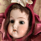 Antique doll head pincushion