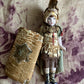 Antique miniature bisque warrior doll