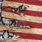 Vintage tattered old 48 star USA flag
