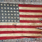 Vintage tattered old 48 star USA flag