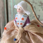 Vintage miniature half doll pincushion