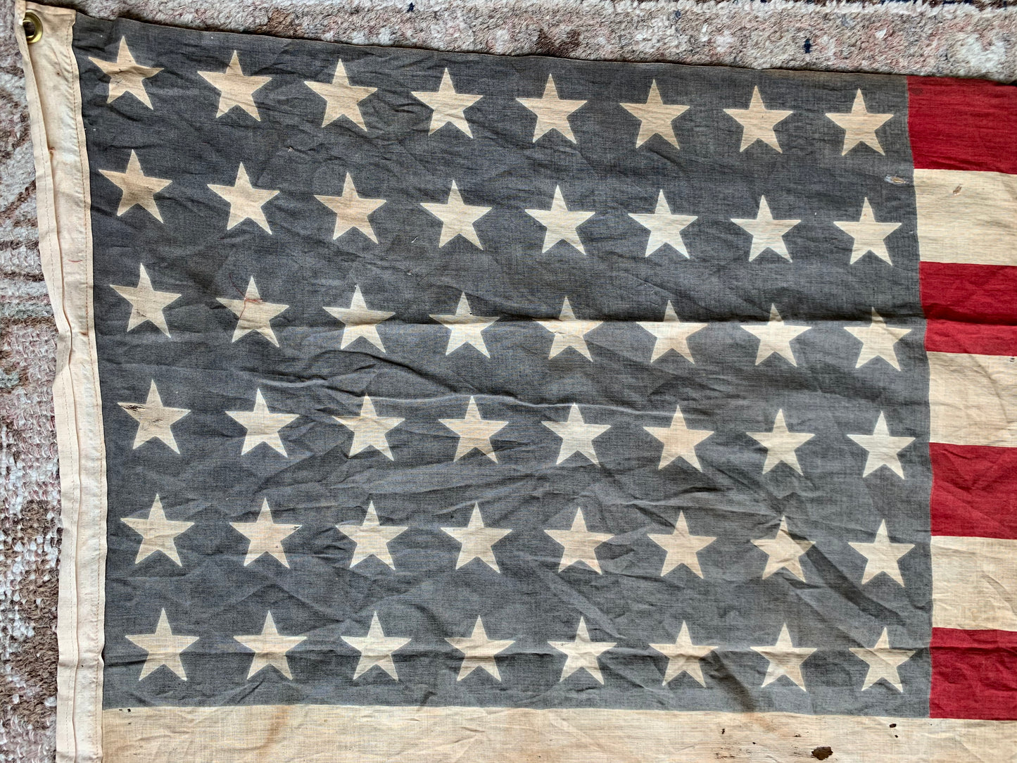 Vintage tattered old 48 star USA flag