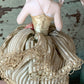 Antique porcelain masked girl figurine