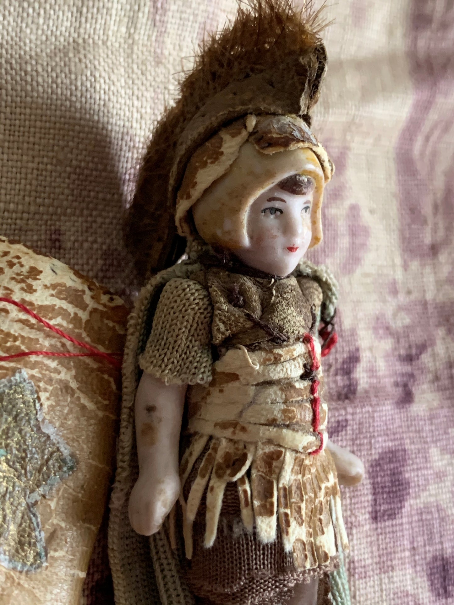 Antique miniature bisque warrior doll