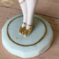 Antique porcelain masked girl figurine