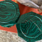 Mid century set of faux malachite green coasters