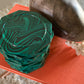 Mid century set of faux malachite green coasters