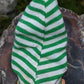 Vintage Christmas elf in green striped pajamas
